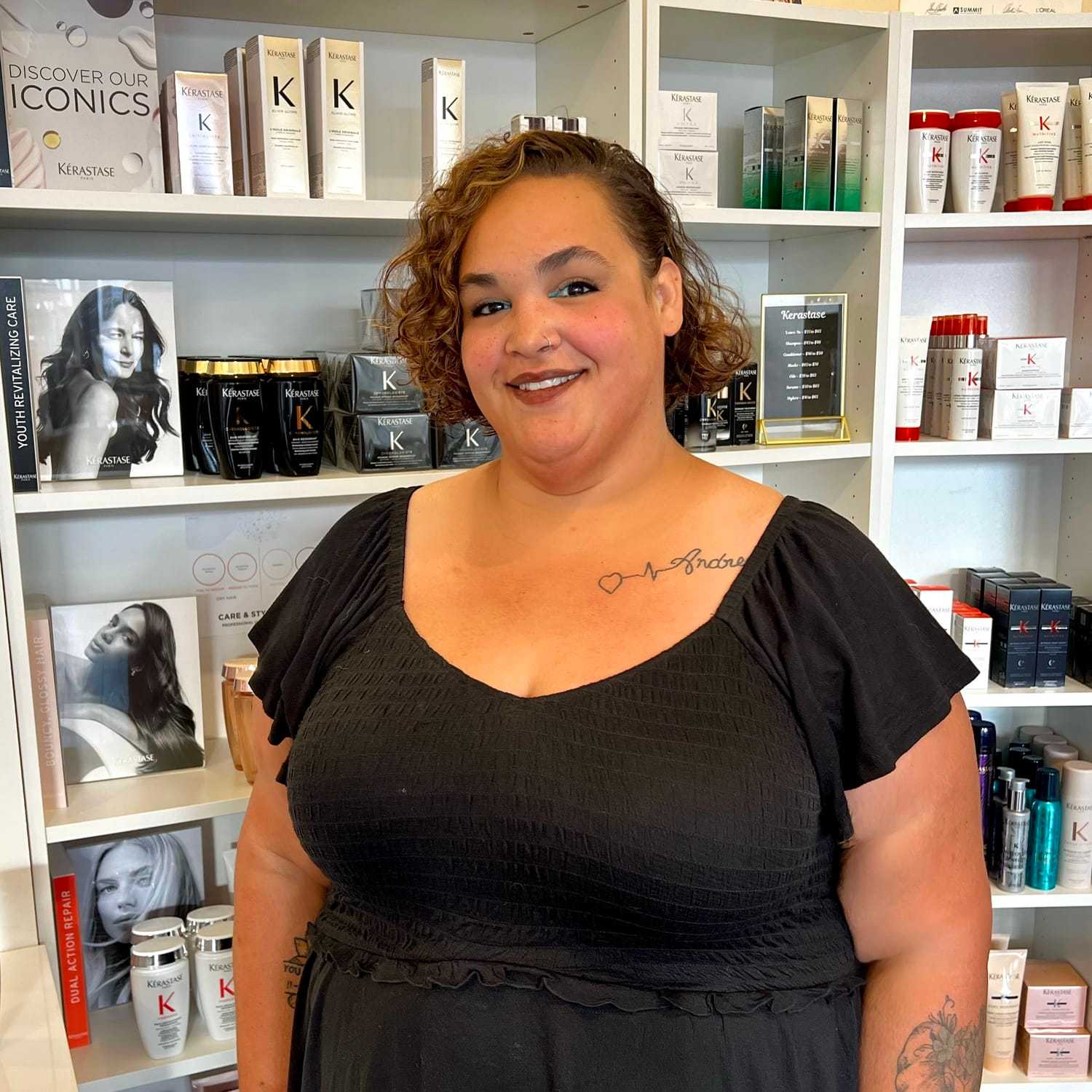 Portrait of Rachel, a professional stylist at The 5th Parlour, showcasing their expertise and style.