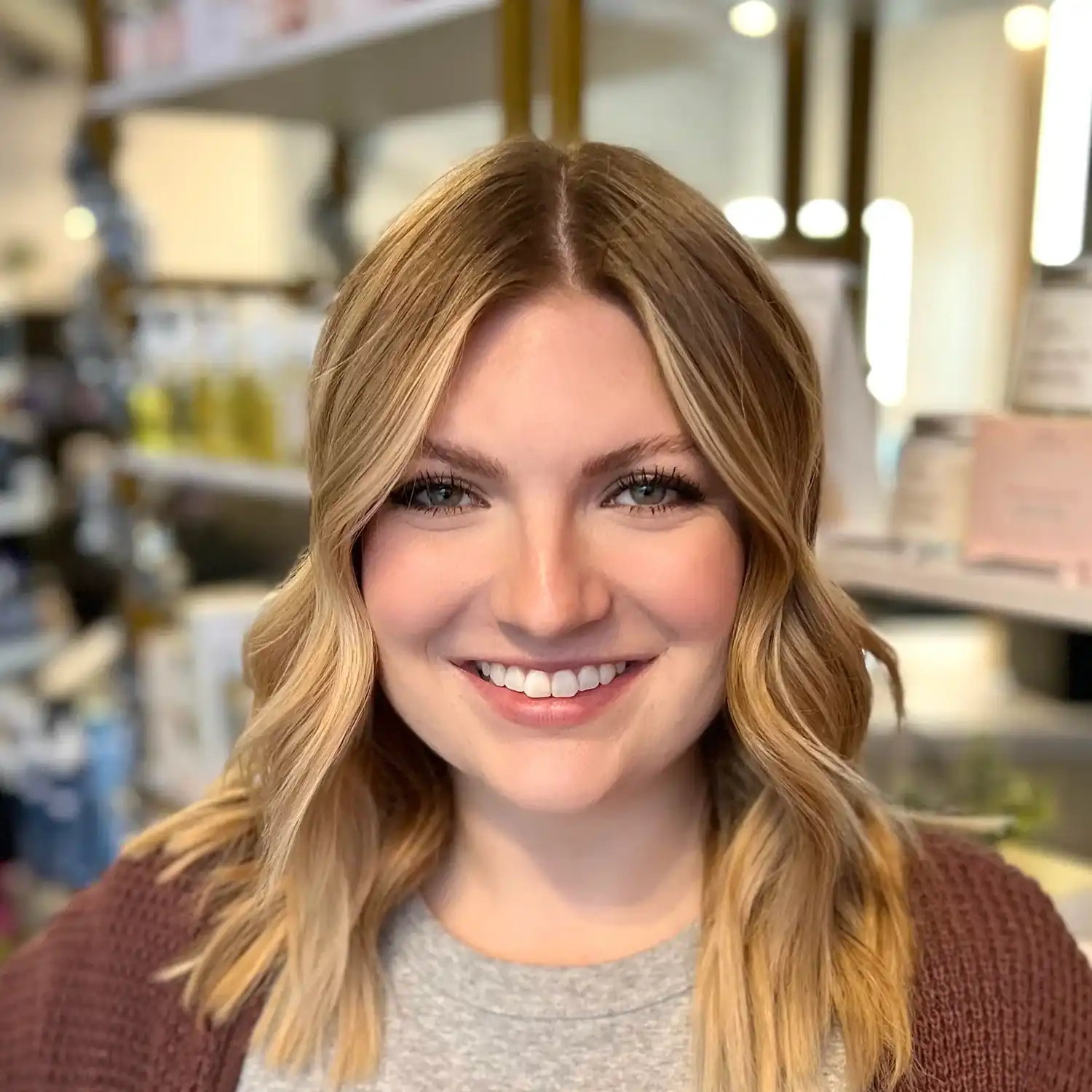 Portrait of Madison, a professional stylist at The 5th Parlour, showcasing their expertise and style.