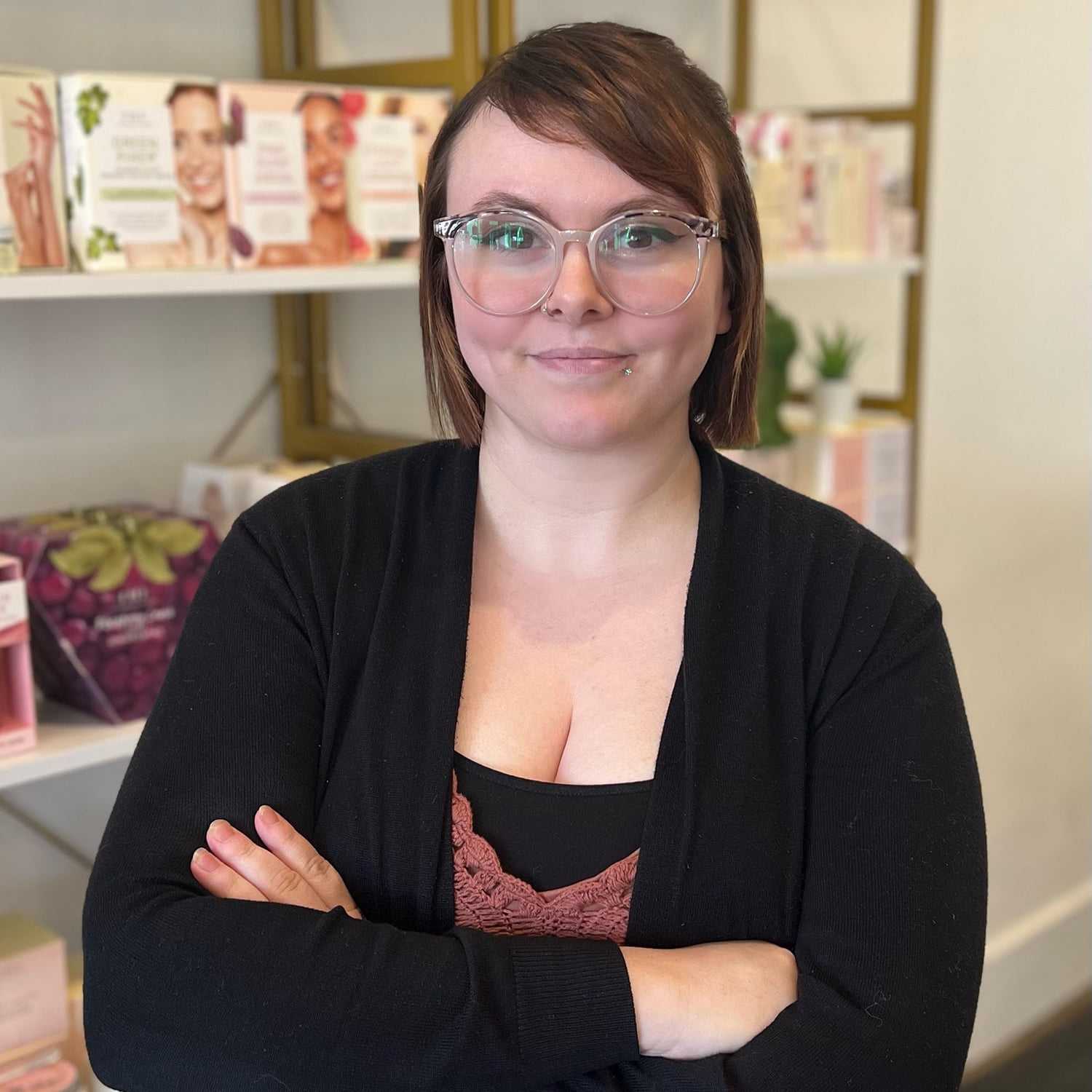 Portrait of Alli, a professional stylist at The 5th Parlour, showcasing their expertise and style.